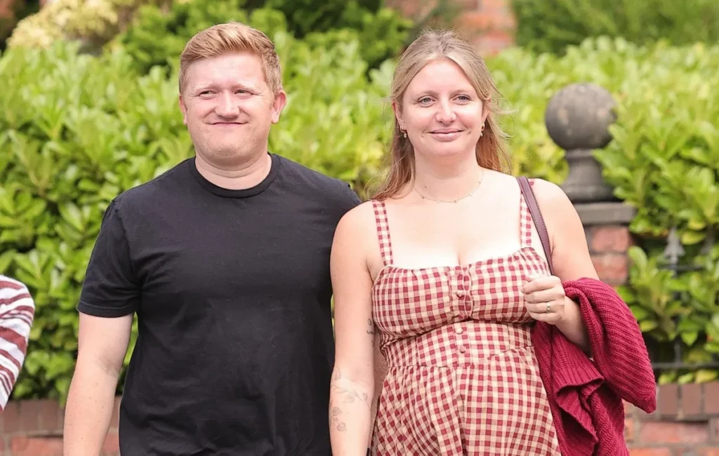 Sam Aston’s Pregnant Spouse Glows at Parenting Occasion